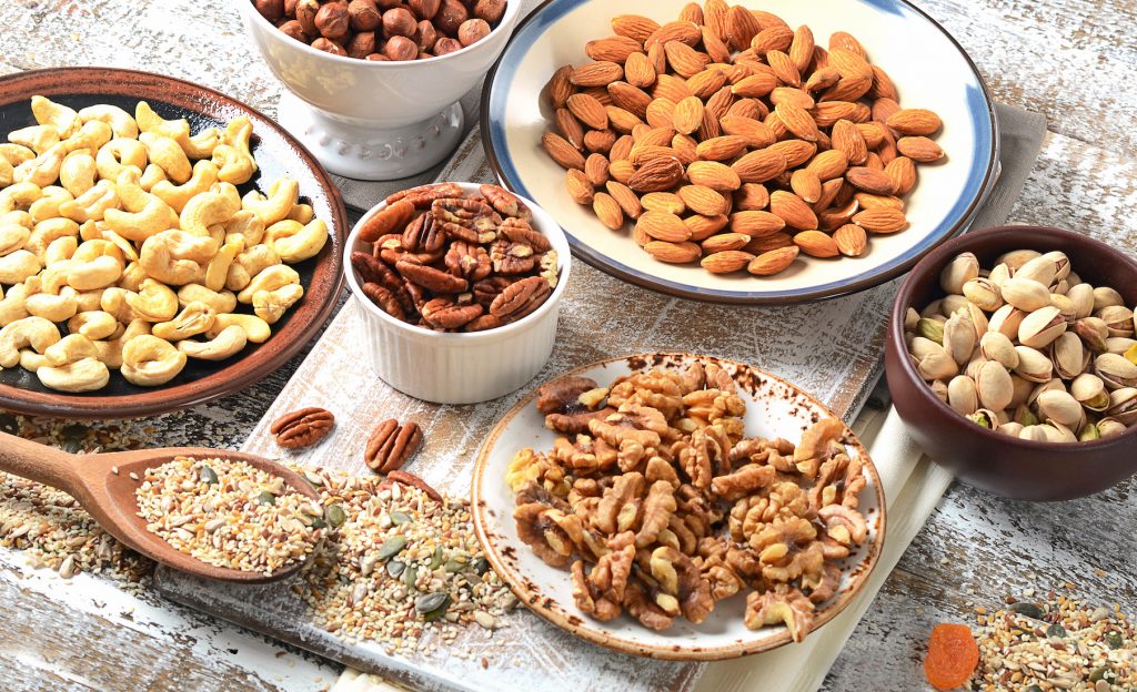 bowls of different nuts and seeds